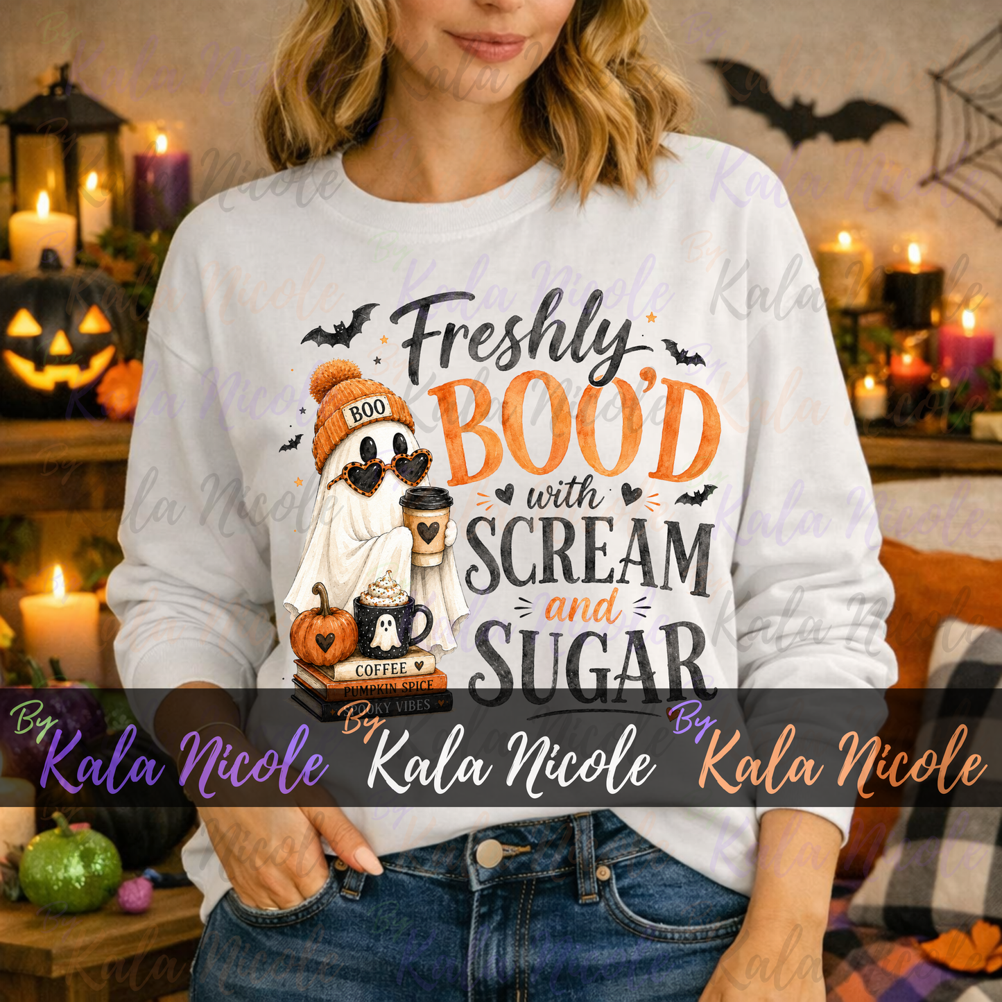A woman wearing a white graphic sweatshirt with a Halloween-themed design that reads 'Freshly BOO'd with SCREAM and SUGAR' and features a ghost, pumpkin, and coffee mug. The background is a cozy, dimly lit Halloween room with candles, jack-o'-lanterns, and spider decorations.